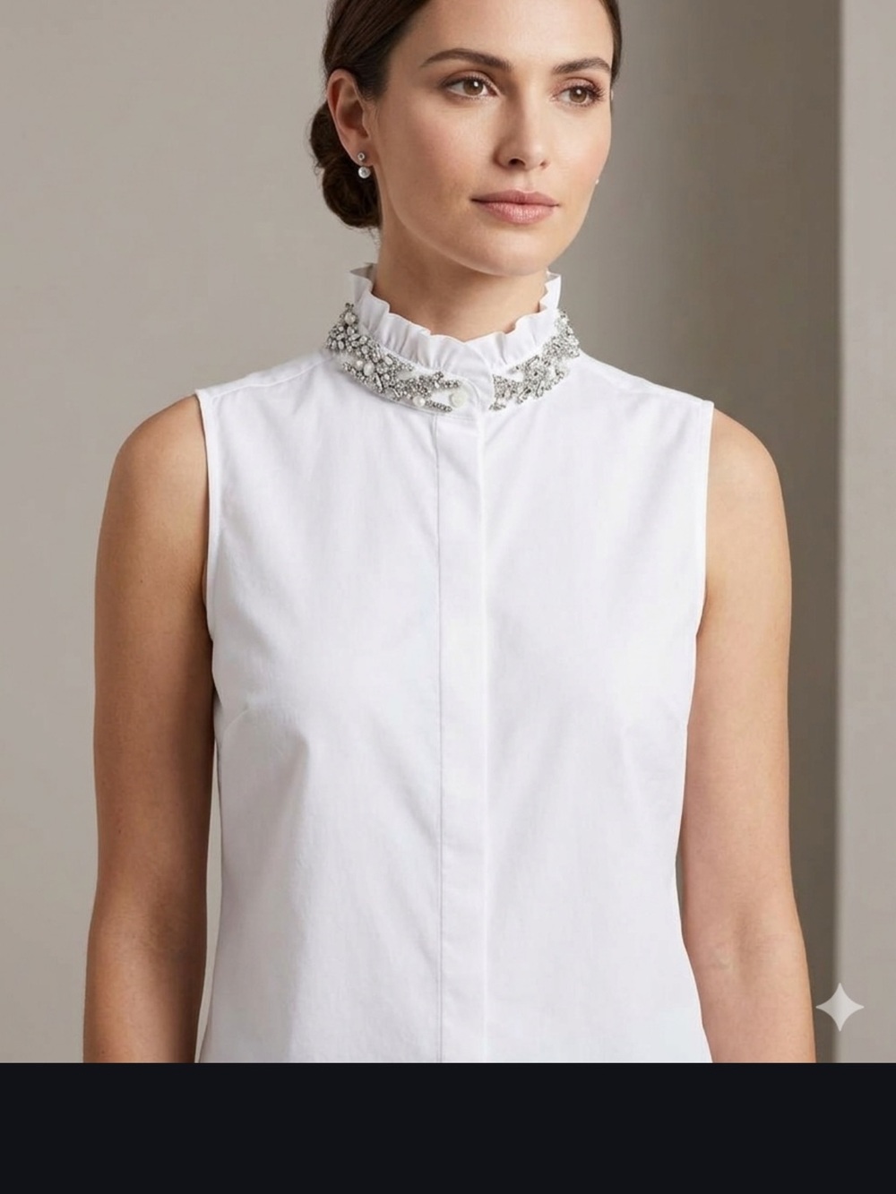J. Crew woman’s sleeveless white blouse with embellished jewel collar